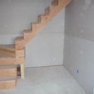 Finished drywall under the stairs.