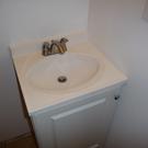 Silicone caulk where the vanity meets the wall