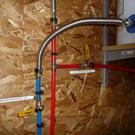 Water heater supply and outlet