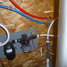 Pump with filter and accumulator