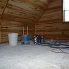 Spraying poly on the loft siding