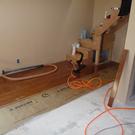Oak flooring being installed.