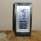 Thermometer showing difference between indoor and outdoor temp.