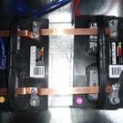 Homemade copper bus bars connect batteries. 2 AWG cable to disconnect box